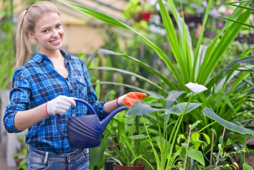 Landscapers planning safe outdoor work with waste control measures
